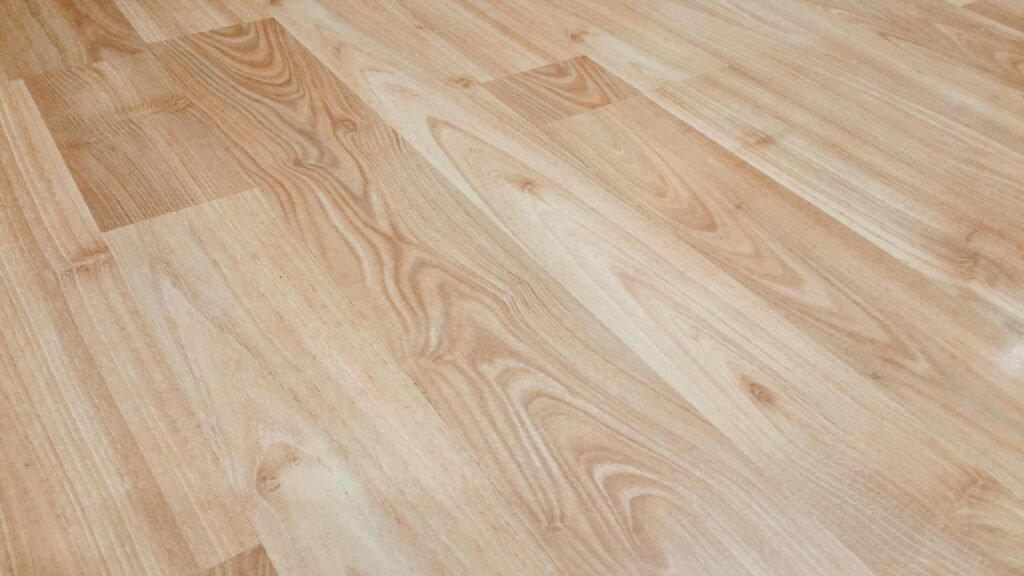 pexels-photo-368754-368754 Smooth light brown wooden flooring with natural texture and patterns.